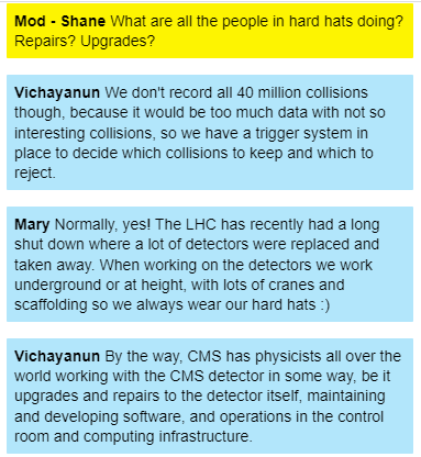 A screenshot of a live chat, a moderator asks what the workers wearing hard hats are doing, a physicist replies that when working on the detectors they always wear hard hats for safety reasons