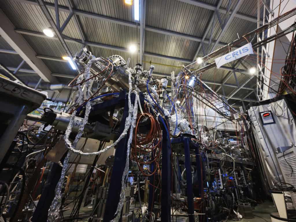 An image of some of the complex equipment used at CERN. There are pipes and wires everywhere.