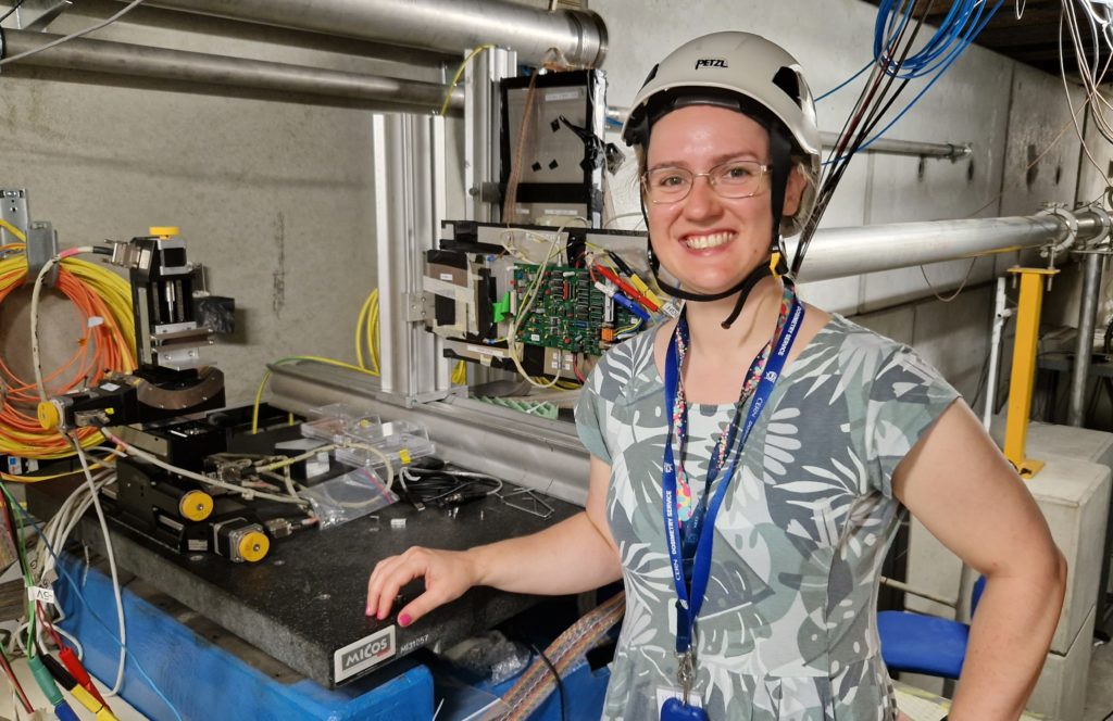 A photo of Kay with the crystal setup in front of the first detector